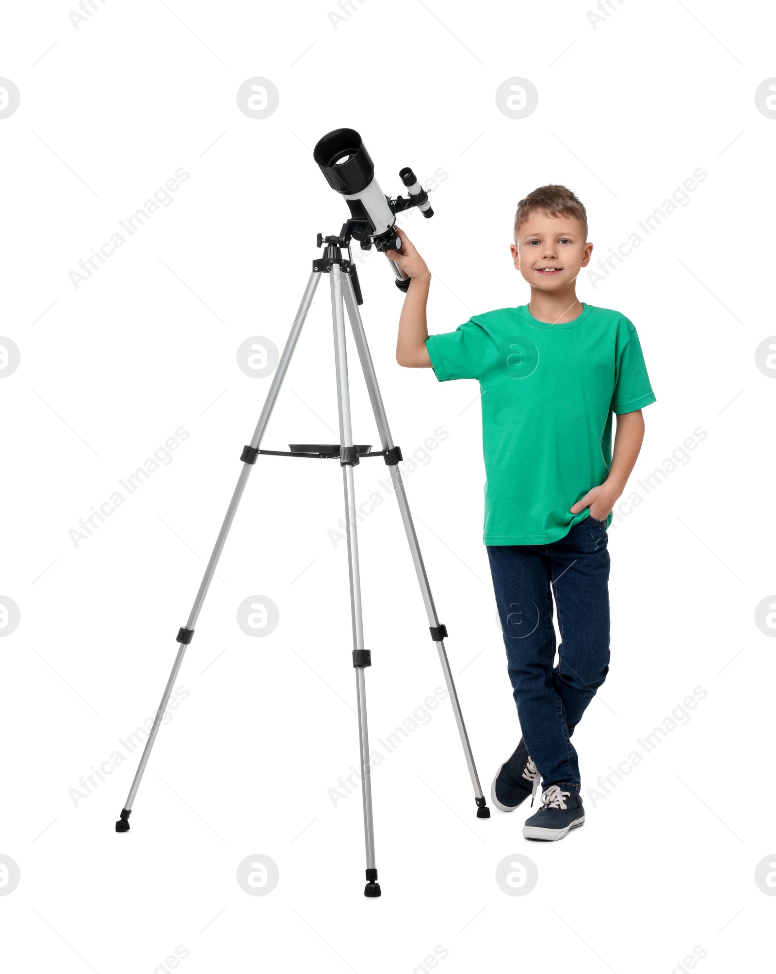 Photo of Happy little boy with telescope on white background