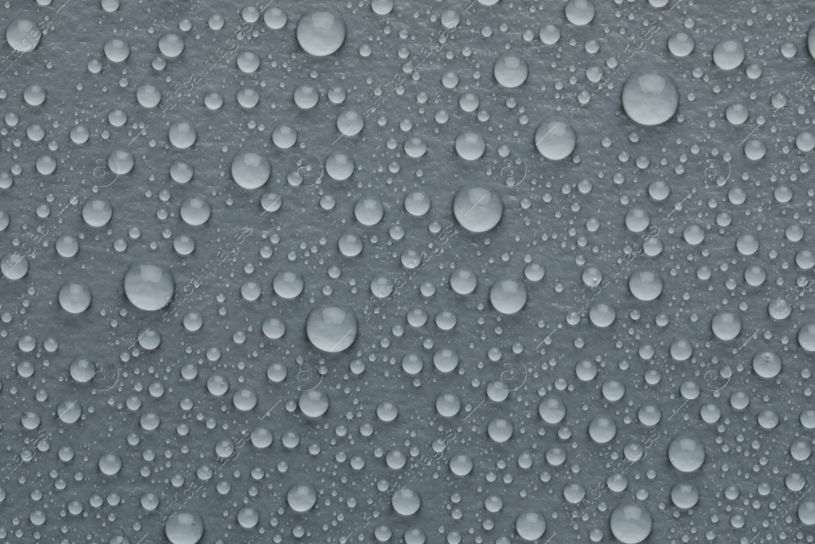 Photo of Water drops on grey background, top view