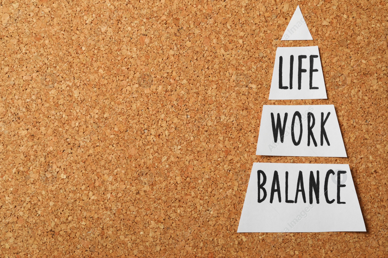 Photo of Paper sheets with words Life, Work, Balance on cork board, flat lay. Space for text