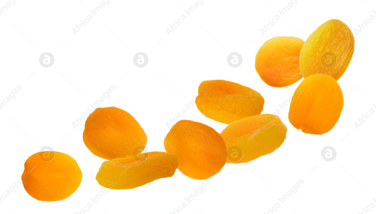 Image of Many tasty dried apricots on white background