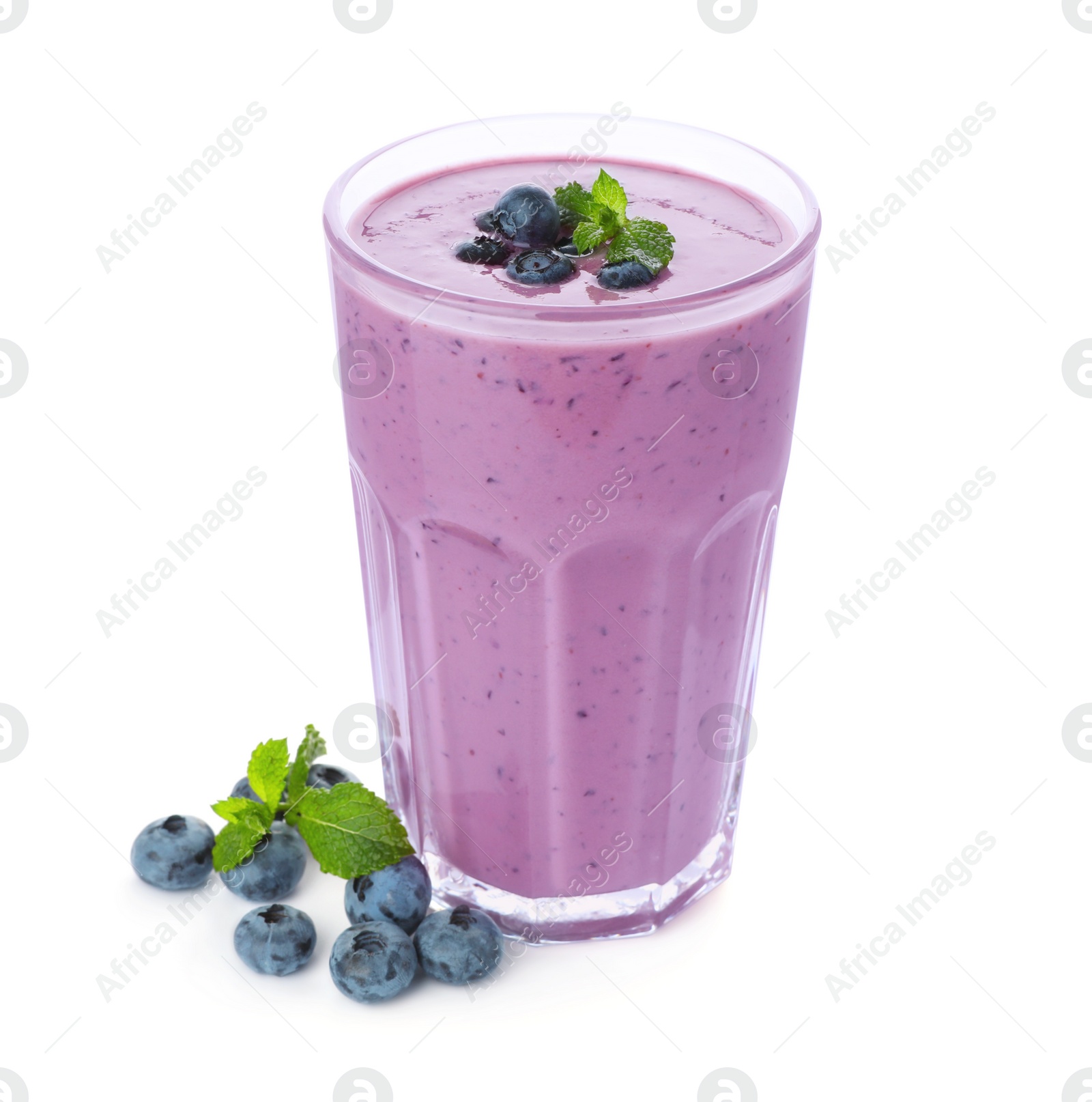 Photo of Glass of blueberry smoothie with fresh berries and mint on white background