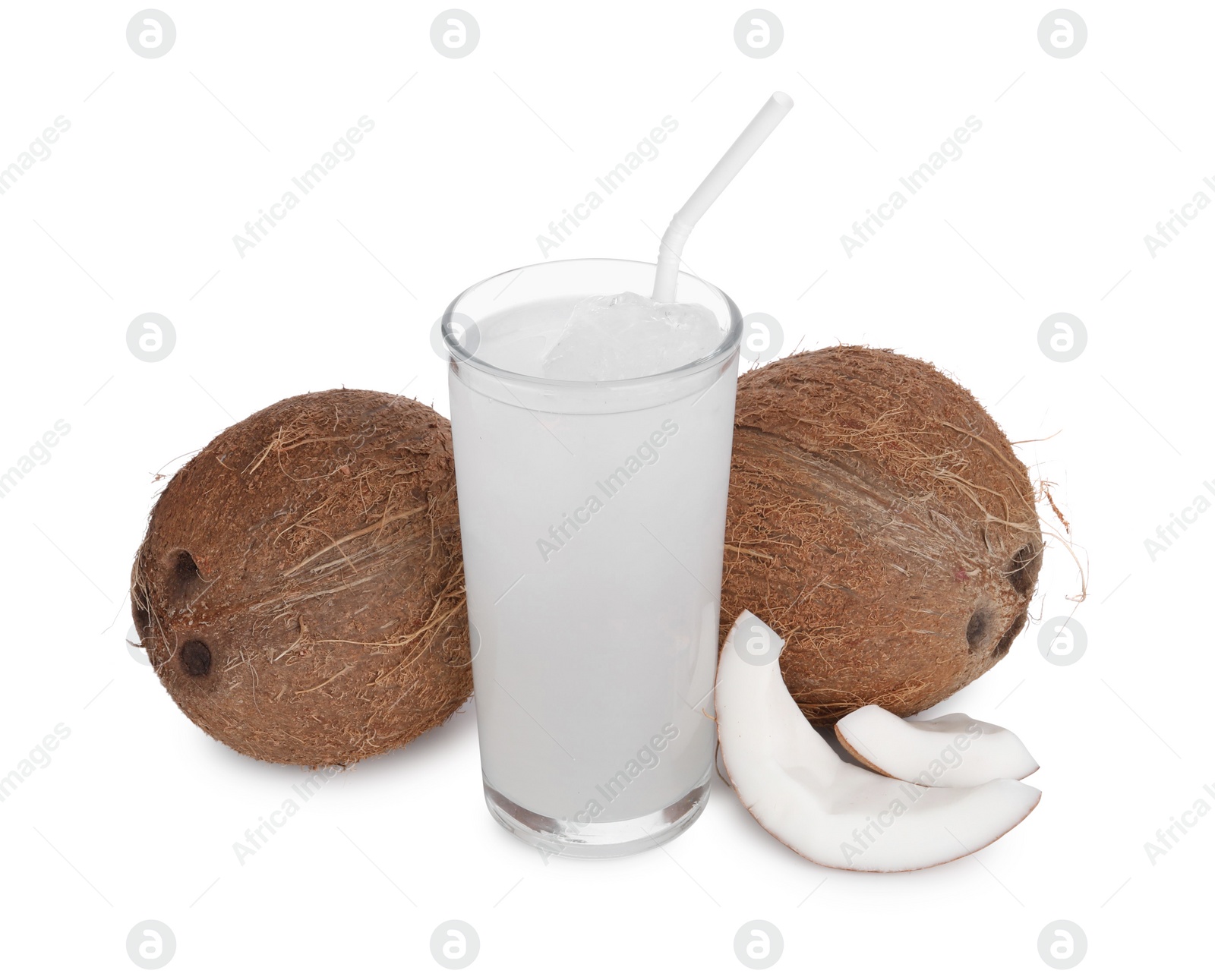 Photo of Glass of coconut water, ice cubes and nuts isolated on white