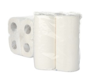 Photo of Packages of rolled paper towels isolated on white