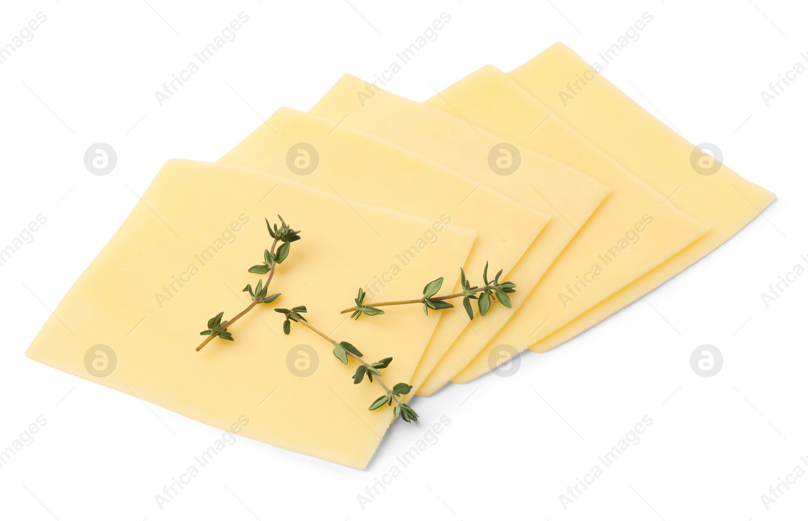 Photo of Slices of tasty fresh cheese and thyme isolated on white