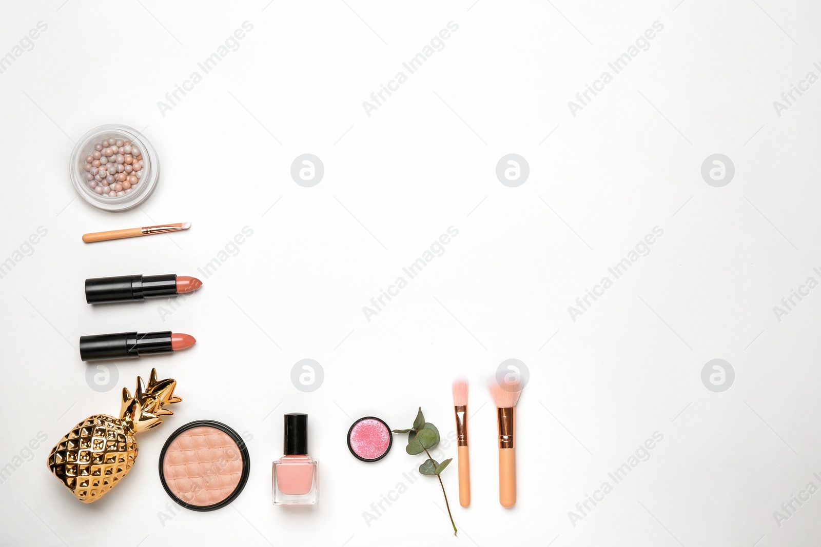 Photo of Decorative makeup products on white background