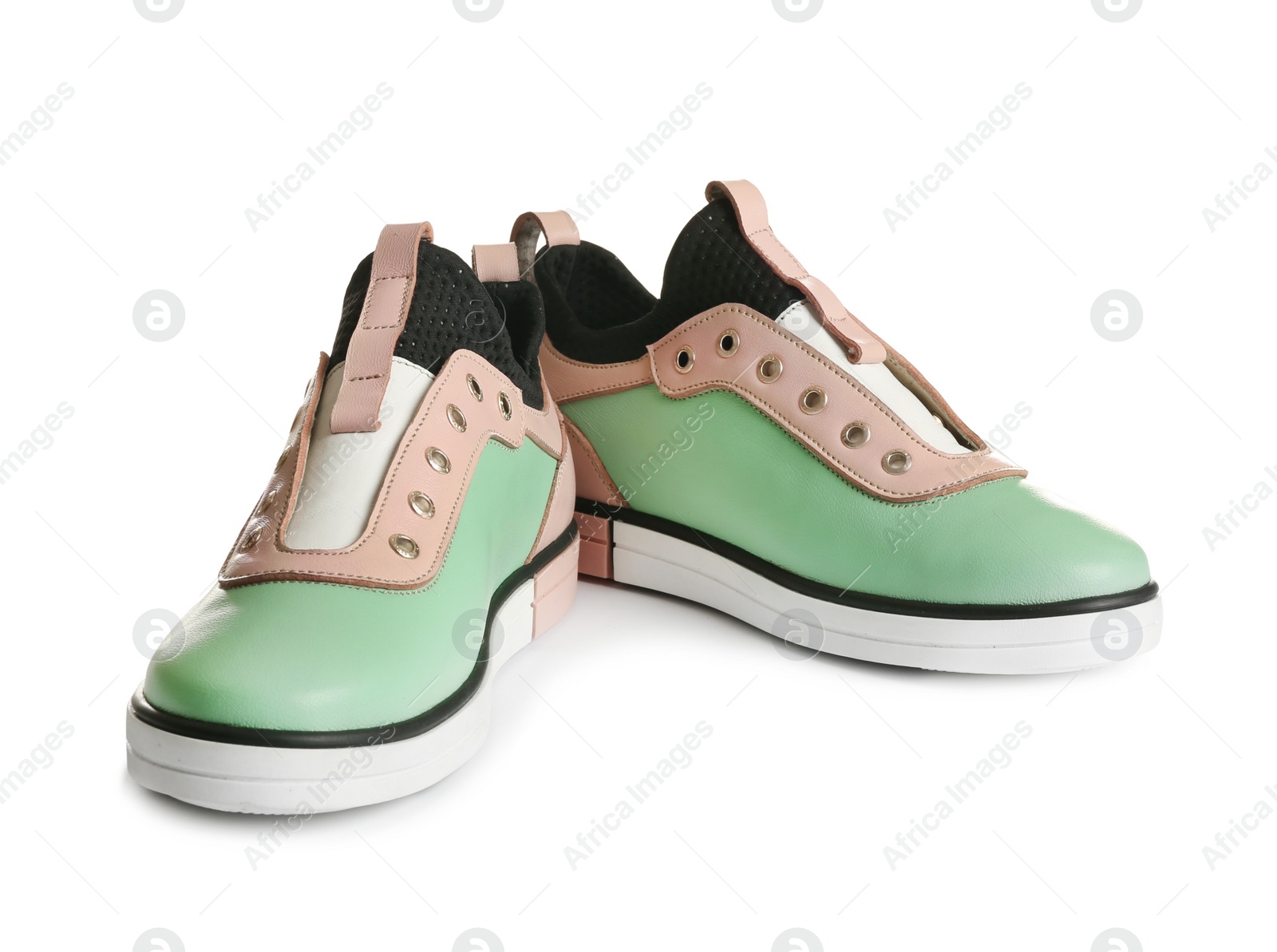 Photo of Pair of stylish modern shoes on white background