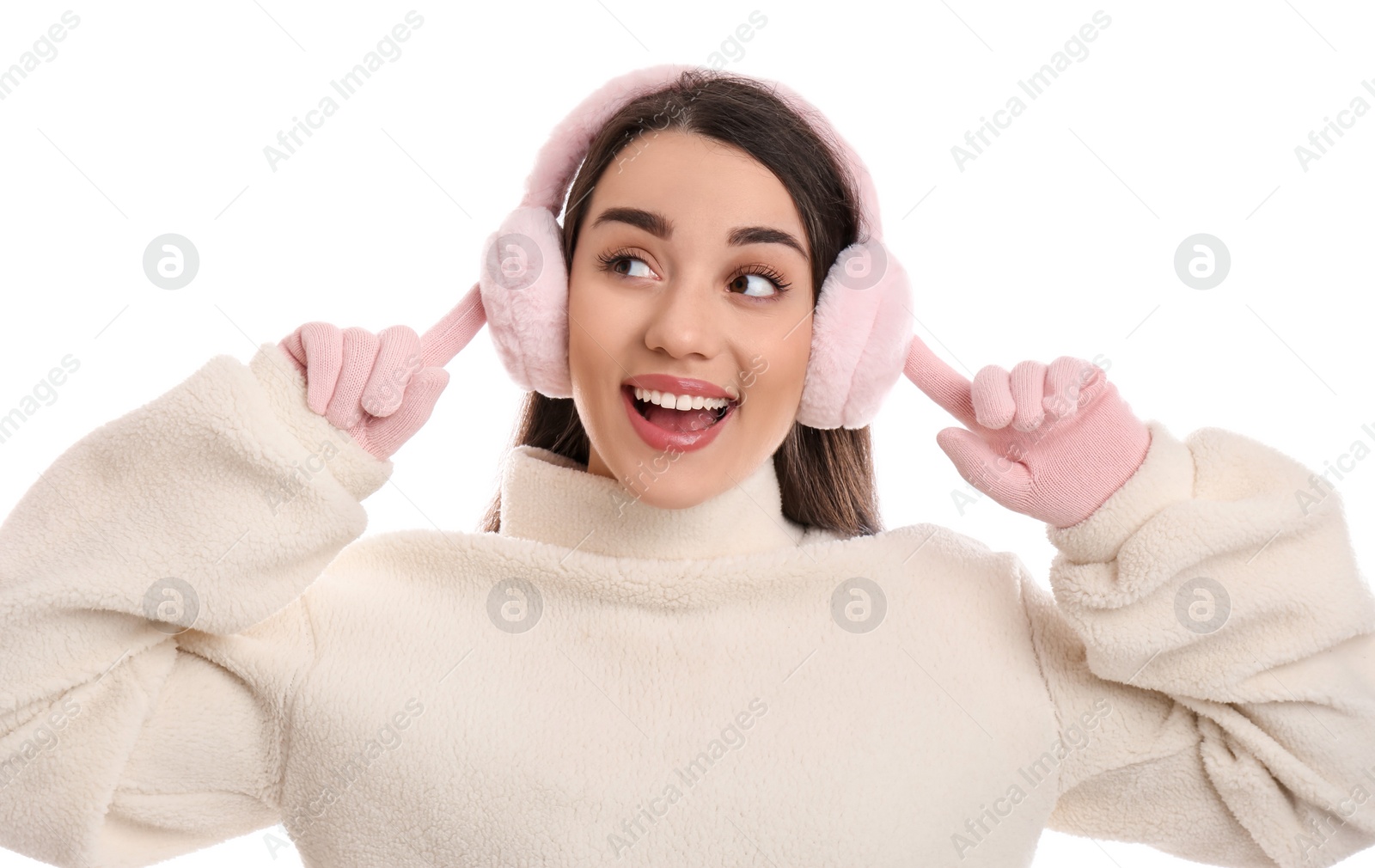 Photo of Beautiful young woman wearing earmuffs on white background