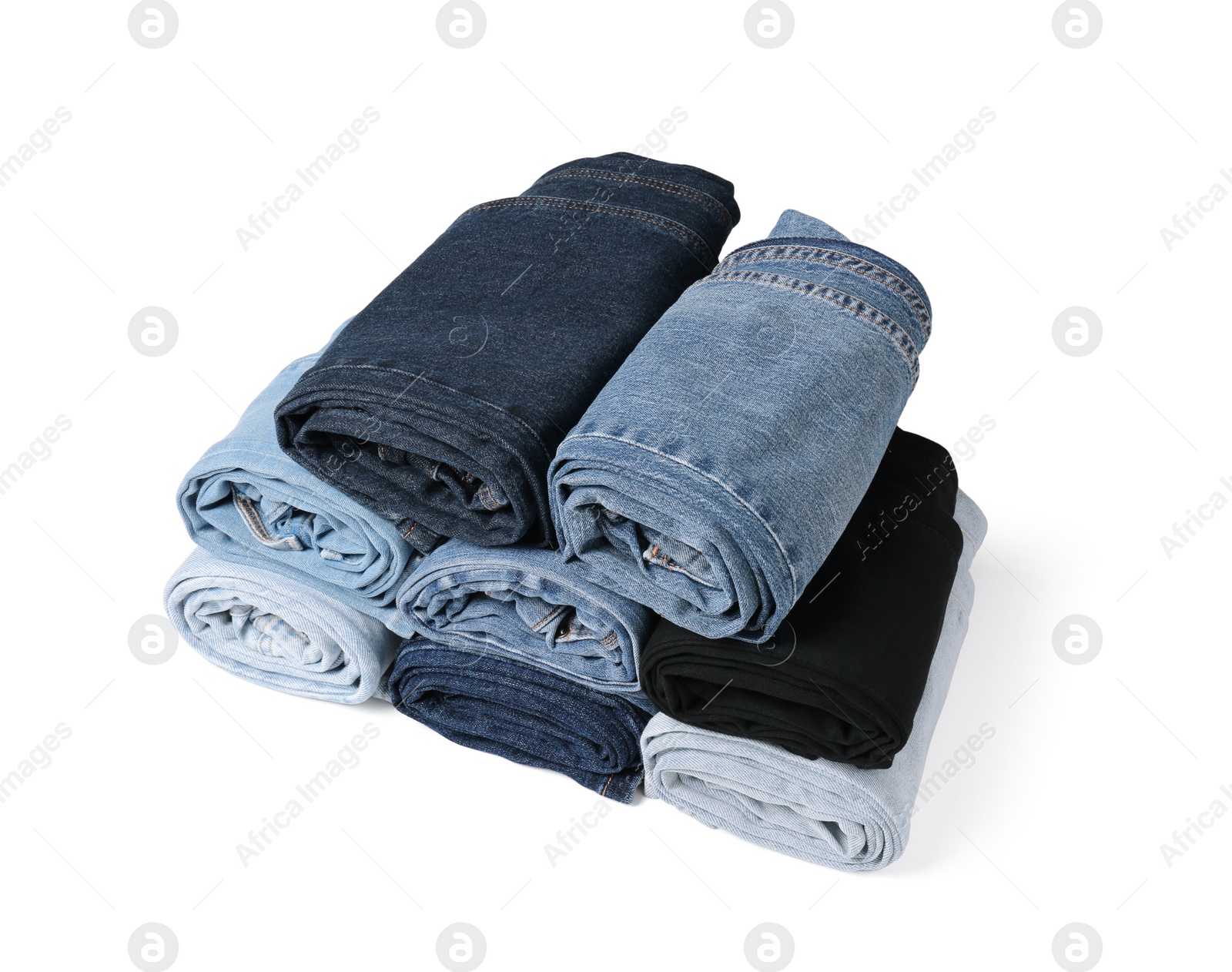 Image of Different stylish rolled jeans isolated on white