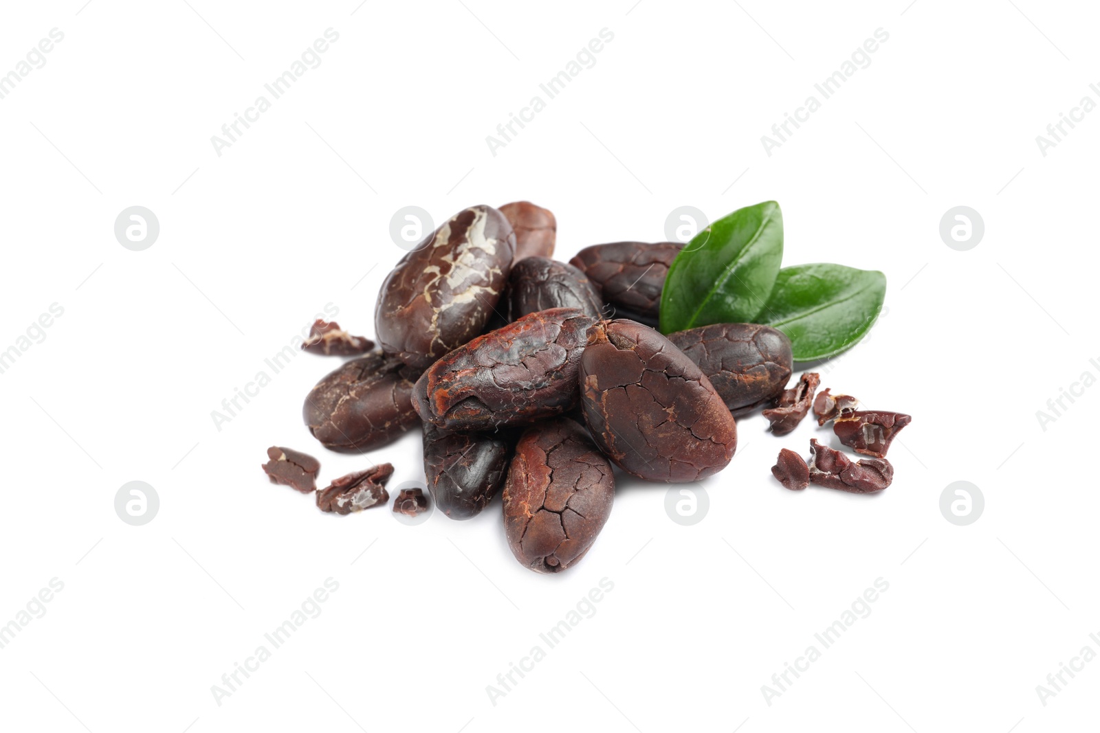 Photo of Pile of aromatic cocoa beans with leaves isolated on white