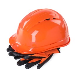 Photo of Safety equipment. Orange hard hat and rubber gloves isolated on white