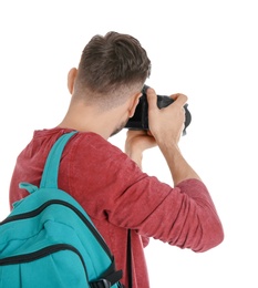 Male photographer with camera on white background