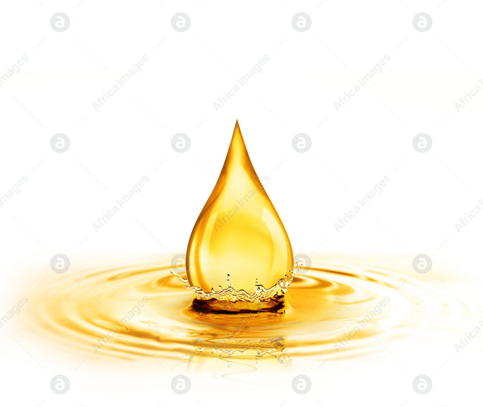 Image of Drop of cooking oil falling into oil on white background