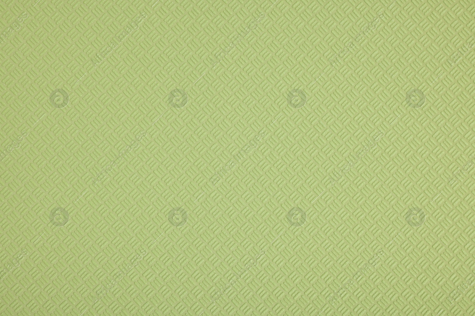 Photo of Stylish green wallpaper as background, closeup view