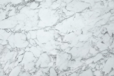 Photo of Texture of marble surface as background, top view