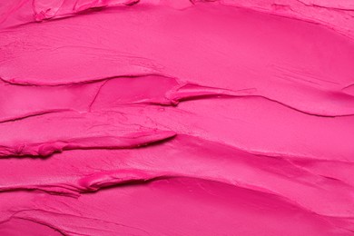 Texture of beautiful lipstick as background, top view