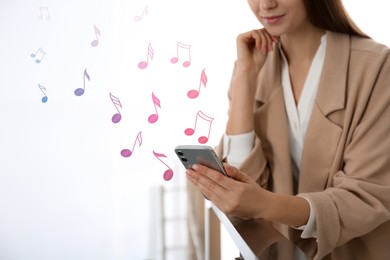 Woman listening to music on mobile phone indoors, closeup. Music notes illustrations flowing from gadget