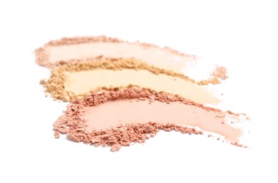 Photo of Swatches of different crushed face powders on white background