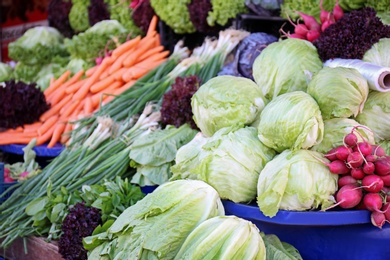 Photo of Market place with many different fresh vegetables