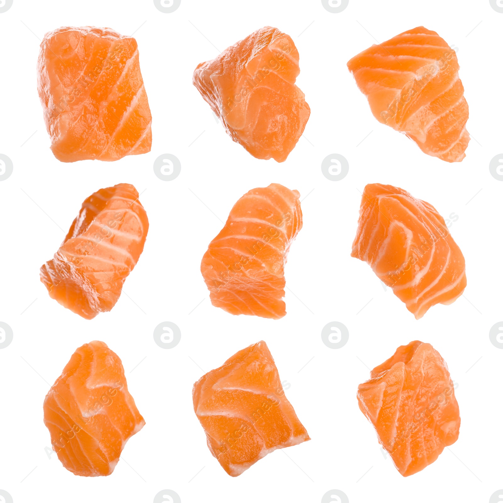 Image of Set with pieces of fresh raw salmon on white background. Fish delicacy