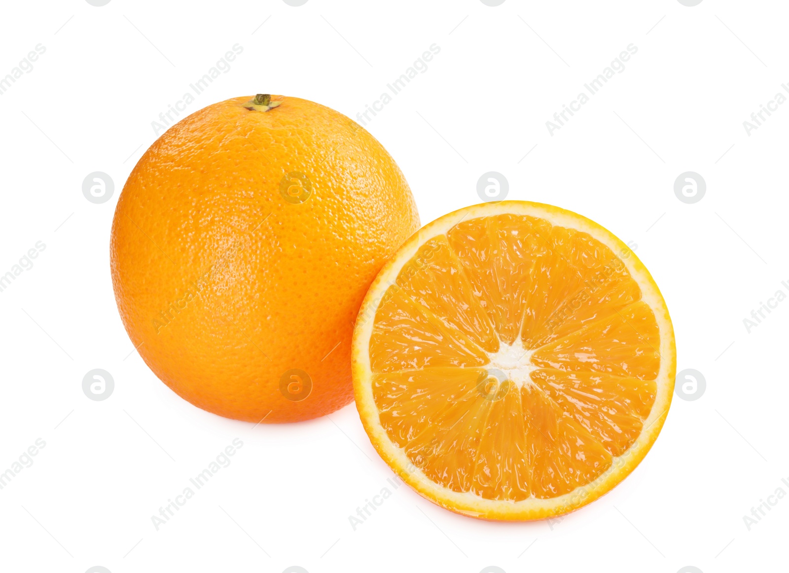 Photo of Whole and cut ripe oranges isolated on white