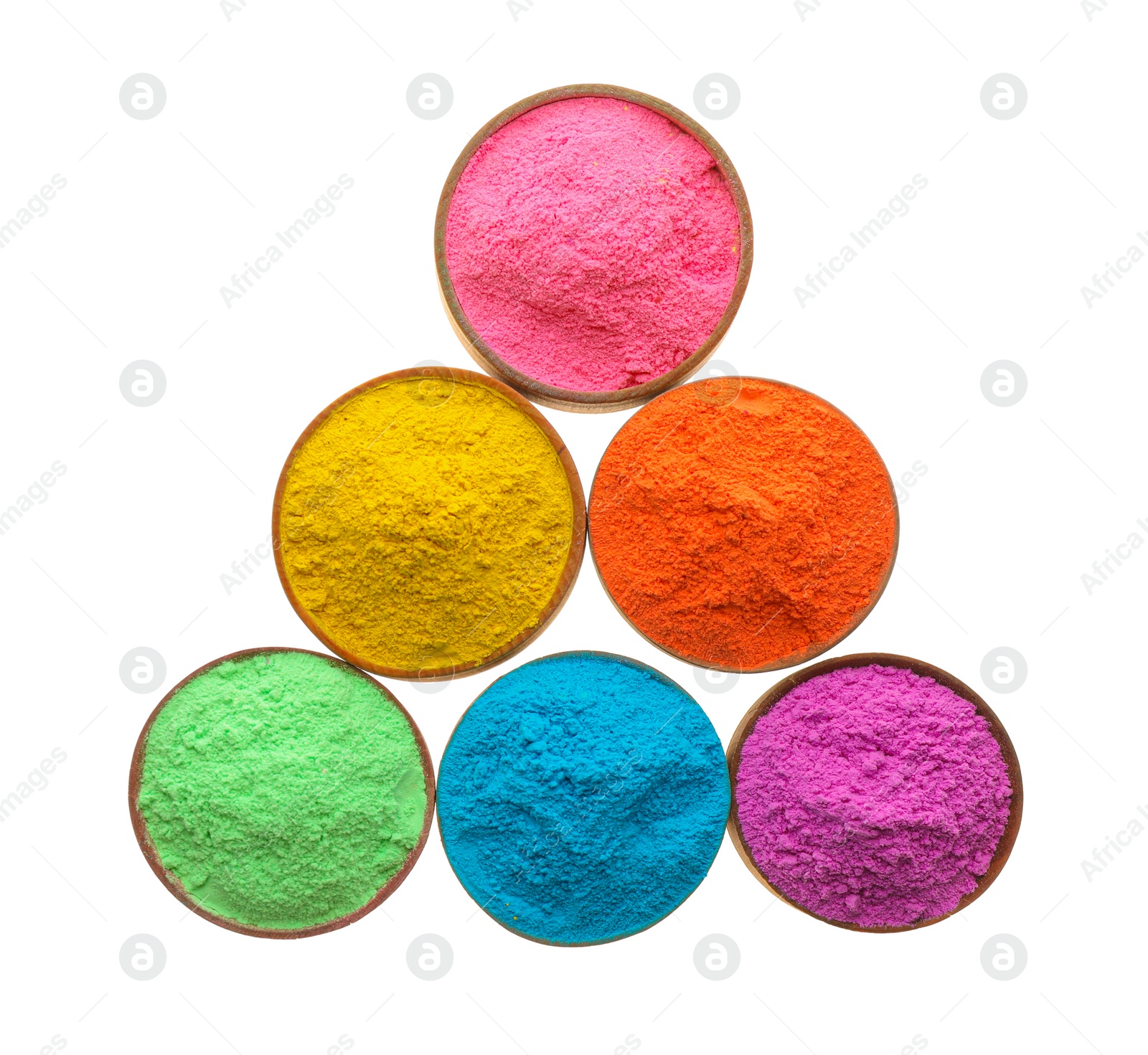 Photo of Colorful powders in bowls on white background, top view. Holi festival celebration