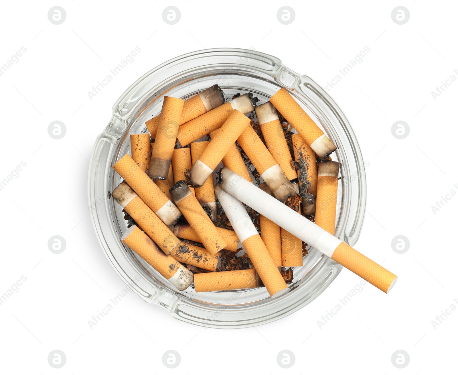 Photo of Glass ashtray full of cigarette stubs isolated on white, top view