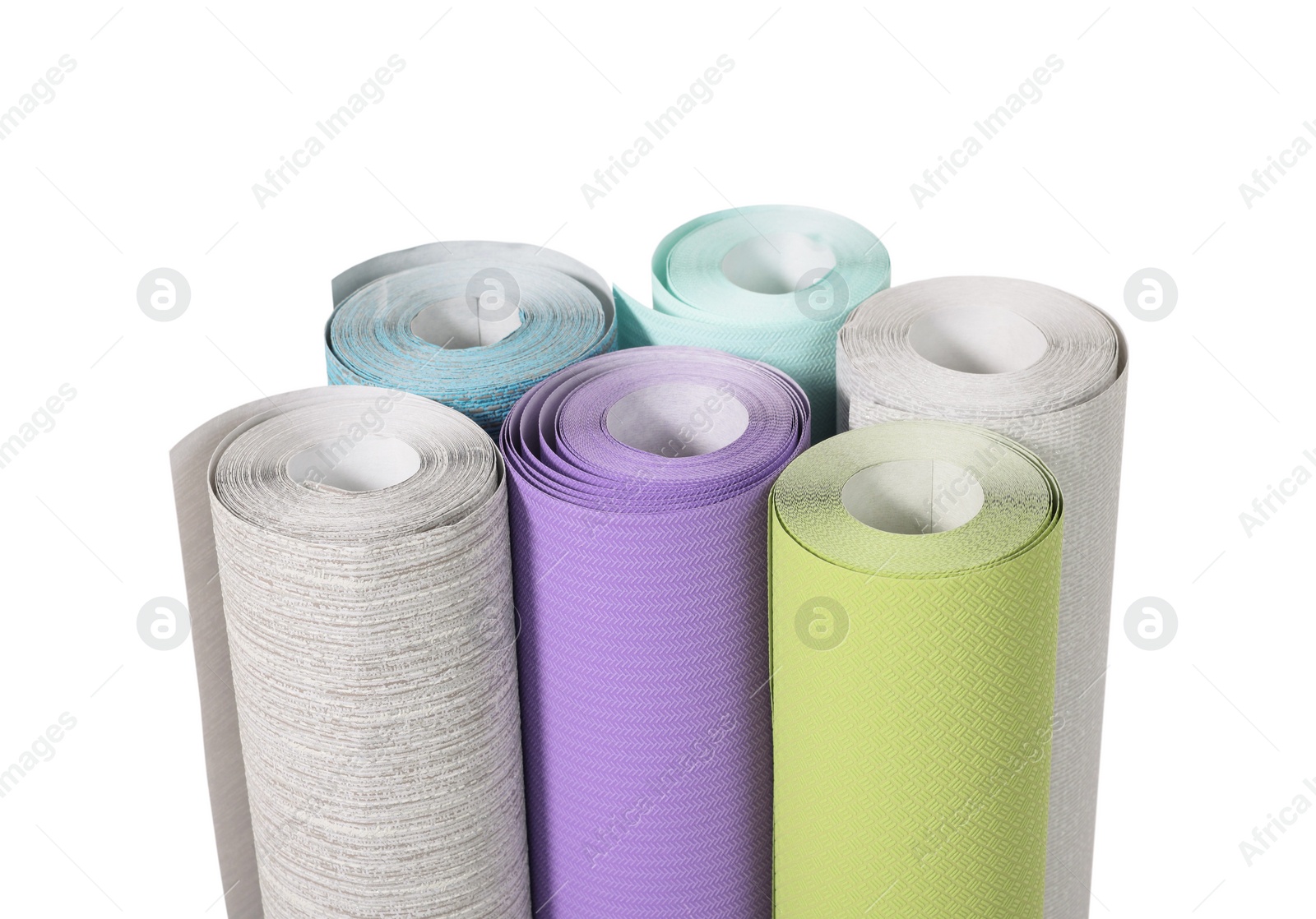 Photo of Many different wallpaper rolls isolated on white