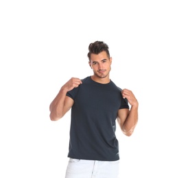 Photo of Young man in t-shirt on white background. Mockup for design