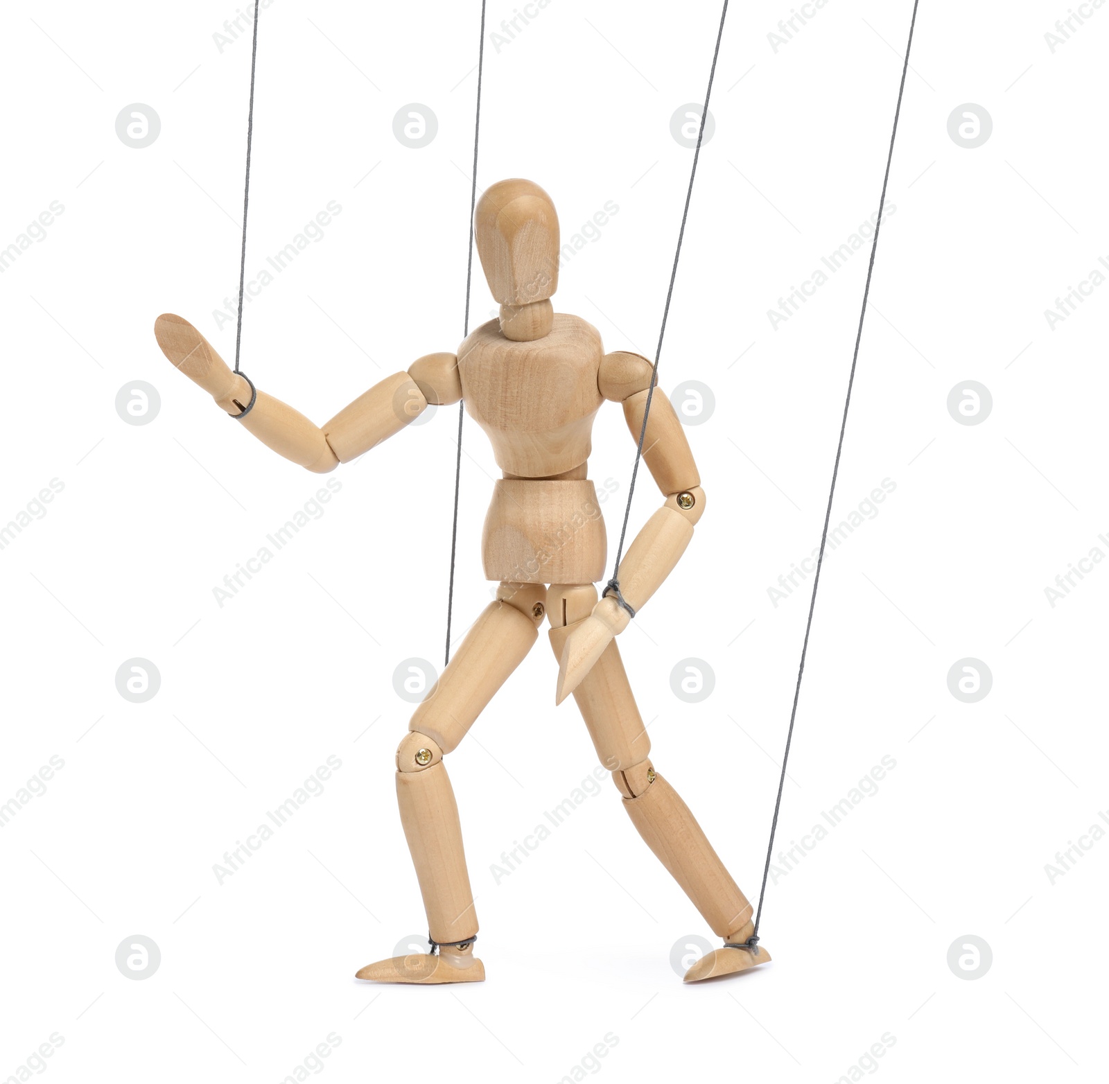 Photo of One wooden puppet with strings on white background