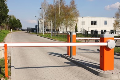 Orange road barriers outdoors on sunny day