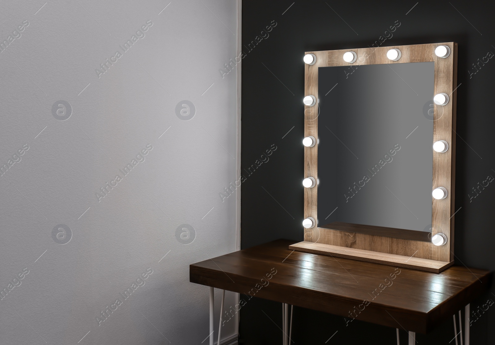 Photo of Beautiful mirror in modern makeup room