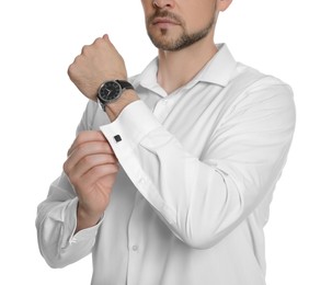 Photo of Man wearing stylish shirt and cufflinks on white background, closeup