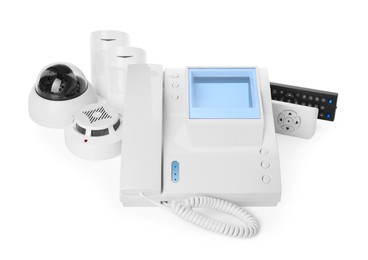 Photo of CCTV camera, remote controls, intercom, smoke and movement detectors on white background. Home security system
