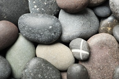 Photo of Many different stones as background, top view