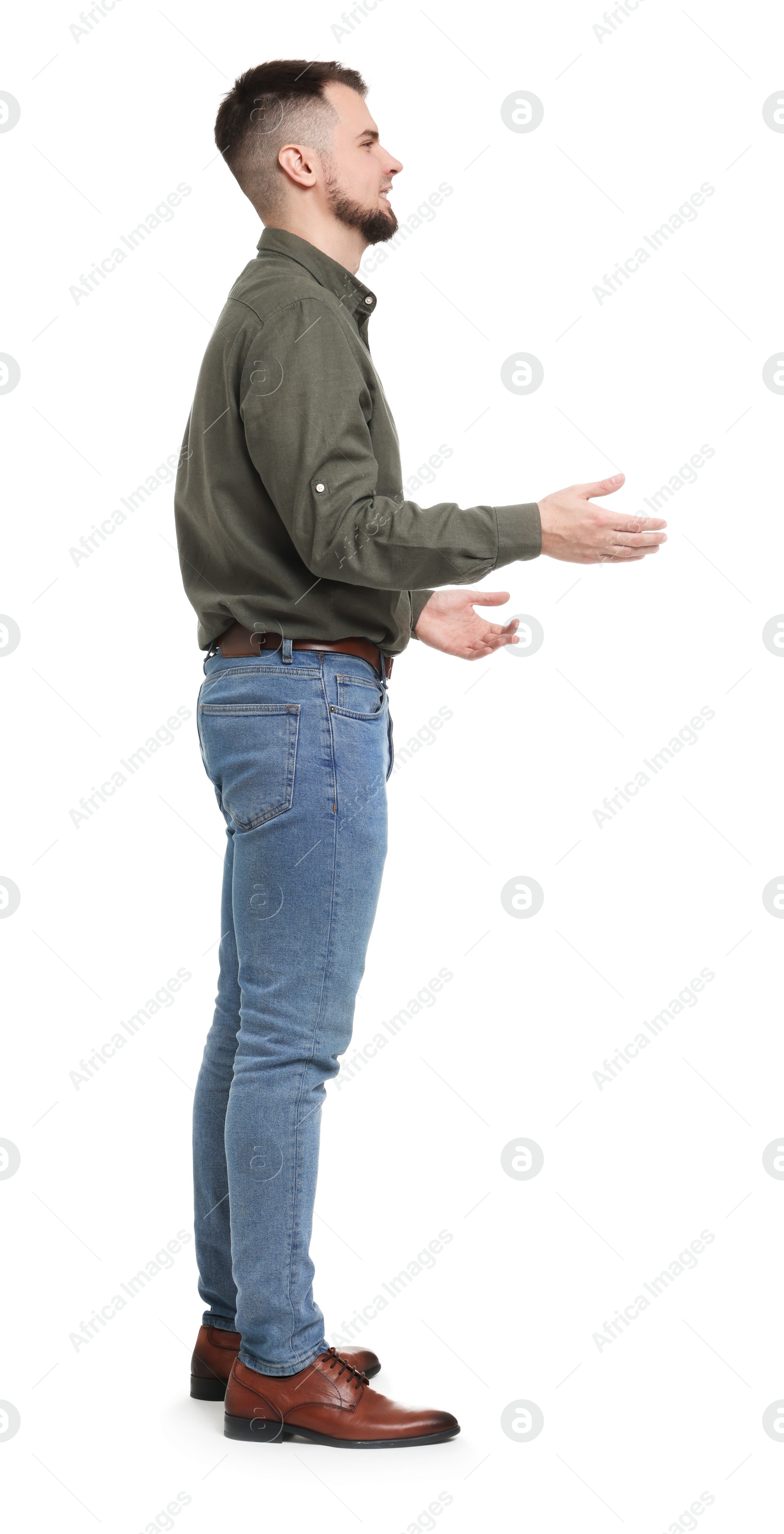 Photo of Man in shirt and jeans on white background