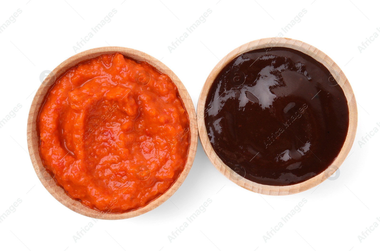 Photo of Different fresh marinades in wooden bowls isolated on white, top view