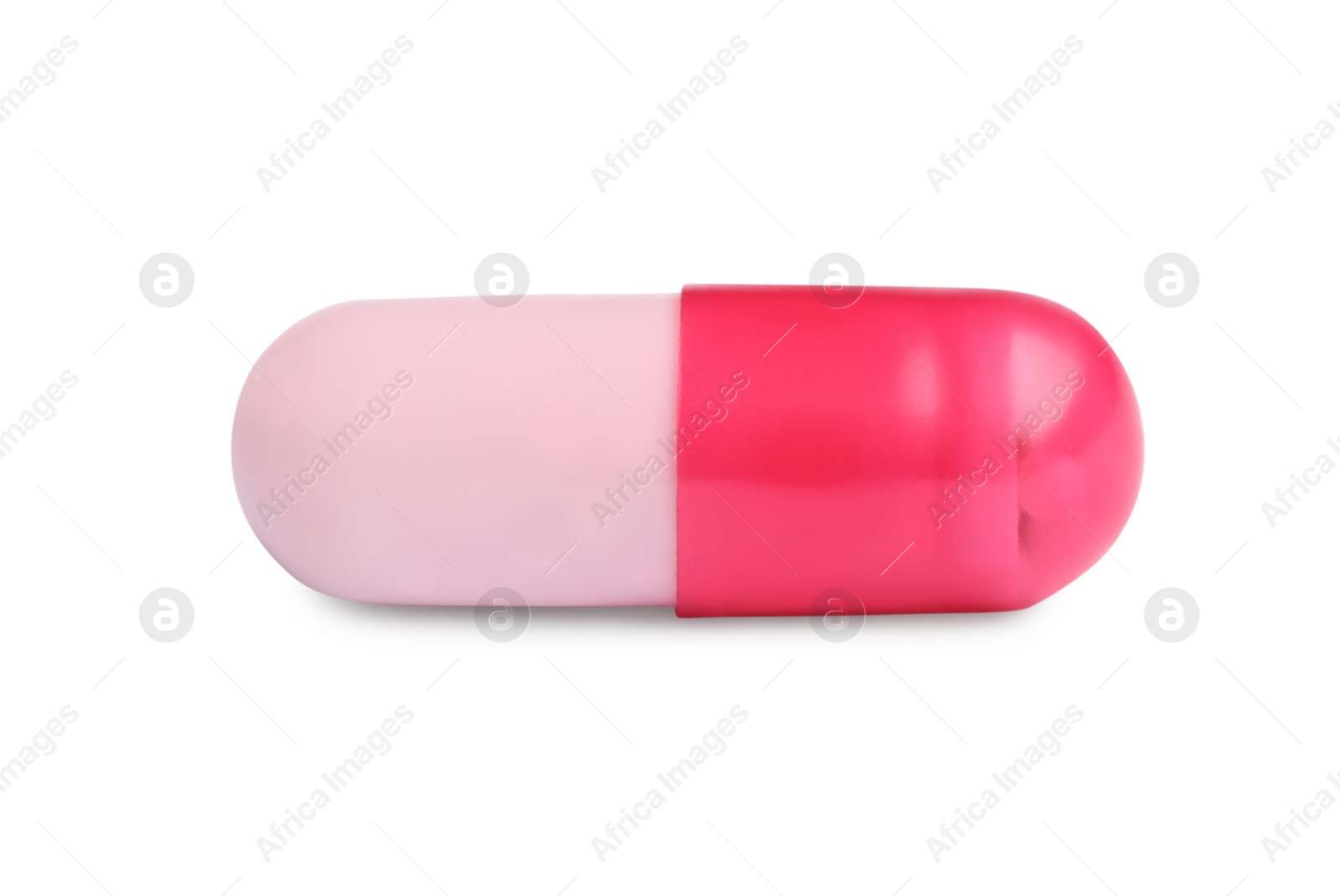 Photo of One pill on white background. Medicinal treatment