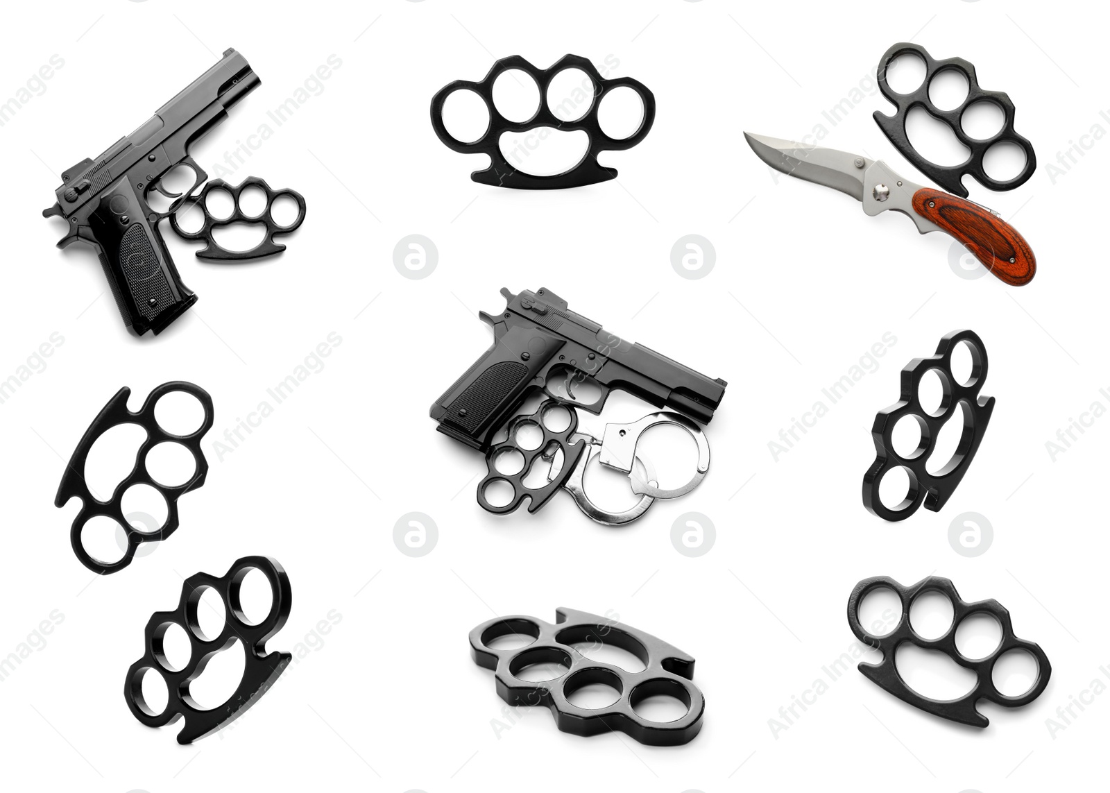 Image of Set with black brass knuckles, guns and knife on white background