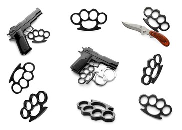 Image of Set with black brass knuckles, guns and knife on white background