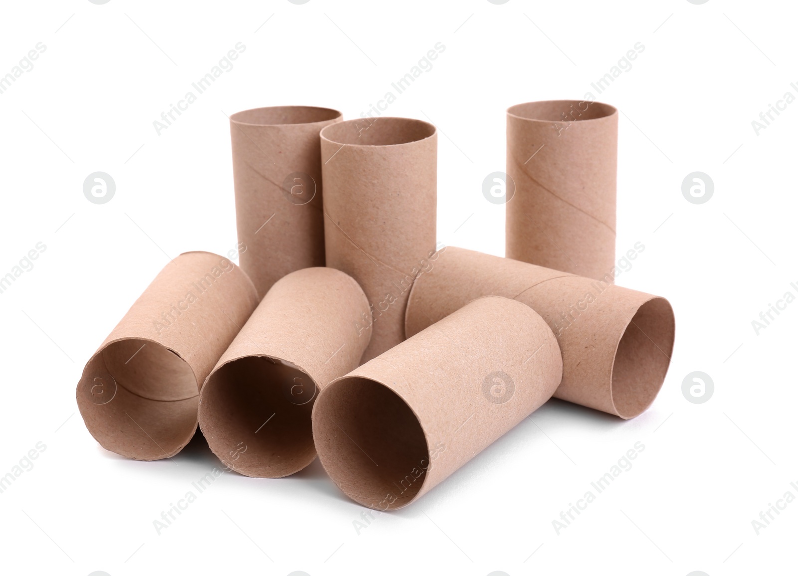 Photo of Empty paper toilet rolls on white background