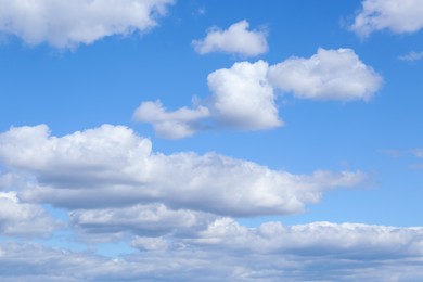 Photo of Picturesque view of beautiful fluffy clouds in light blue sky