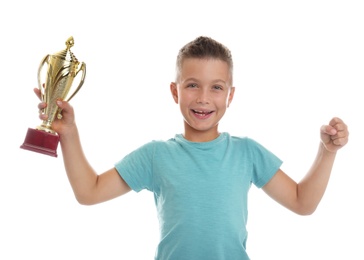 Photo of Happy boy with golden winning cup isolated on white