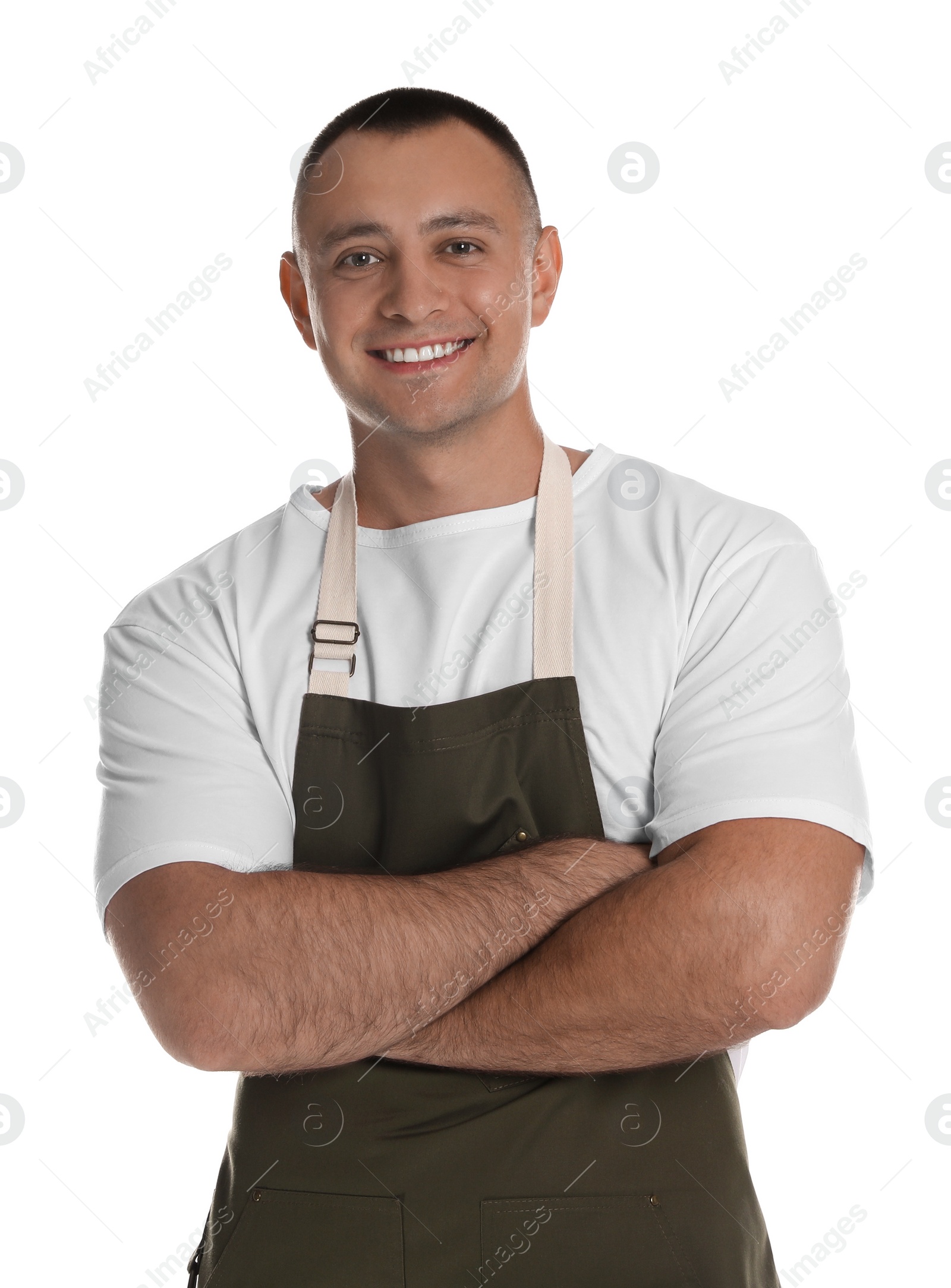 Photo of Portrait of happy young waiter in uniform on white background