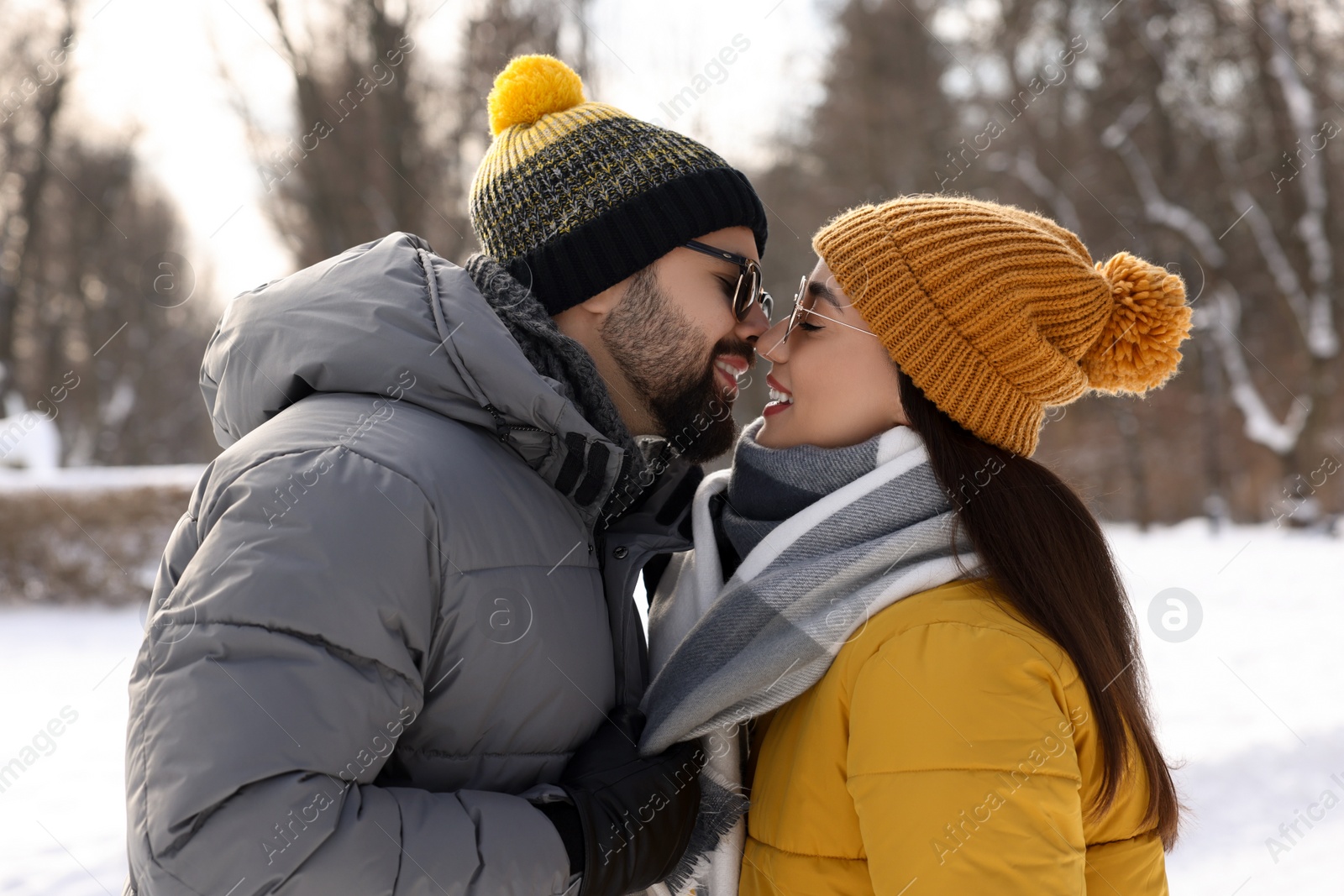 Photo of Beautiful happy couple spending time together on winter day