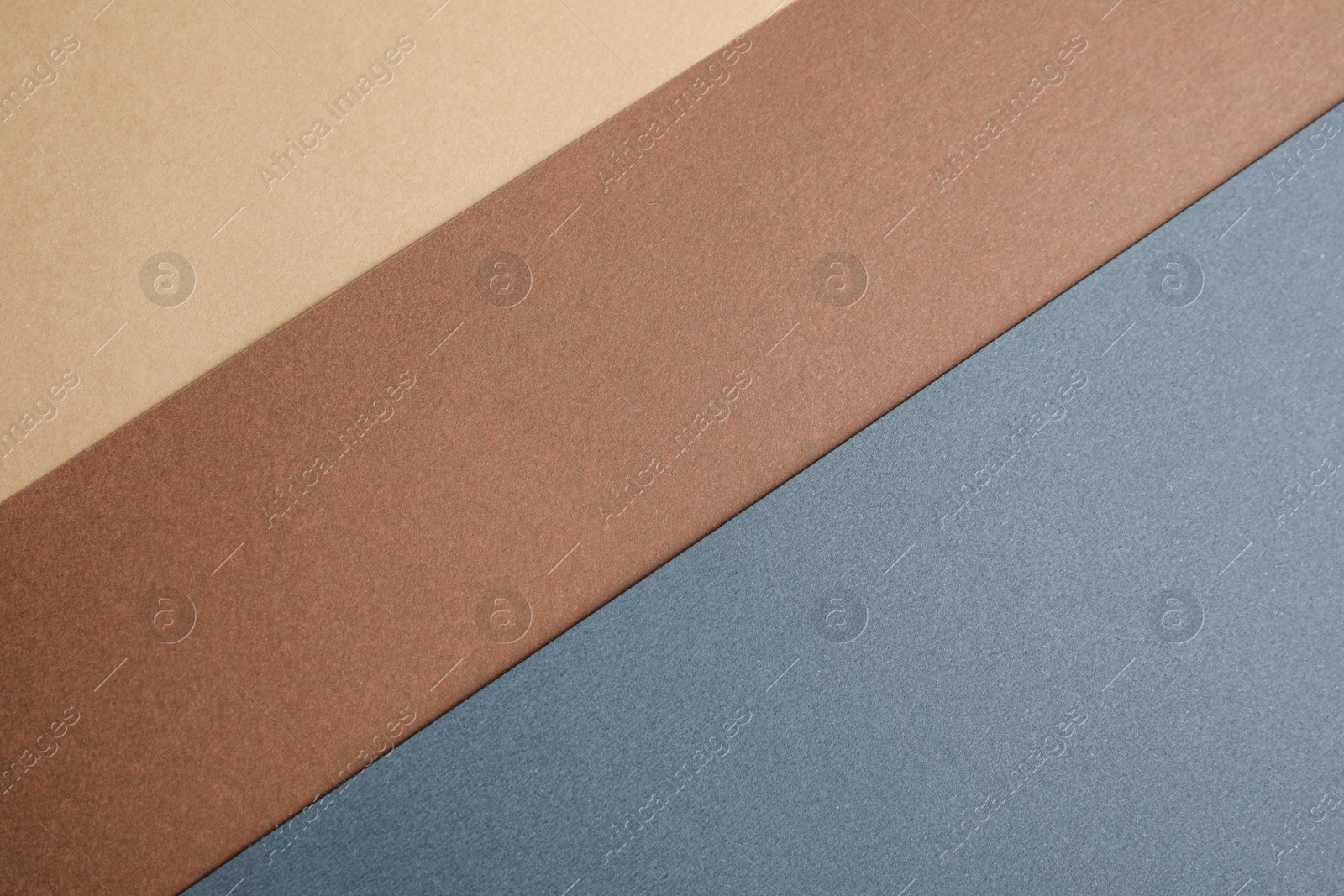 Photo of Colorful sheets of cardboard as background, top view