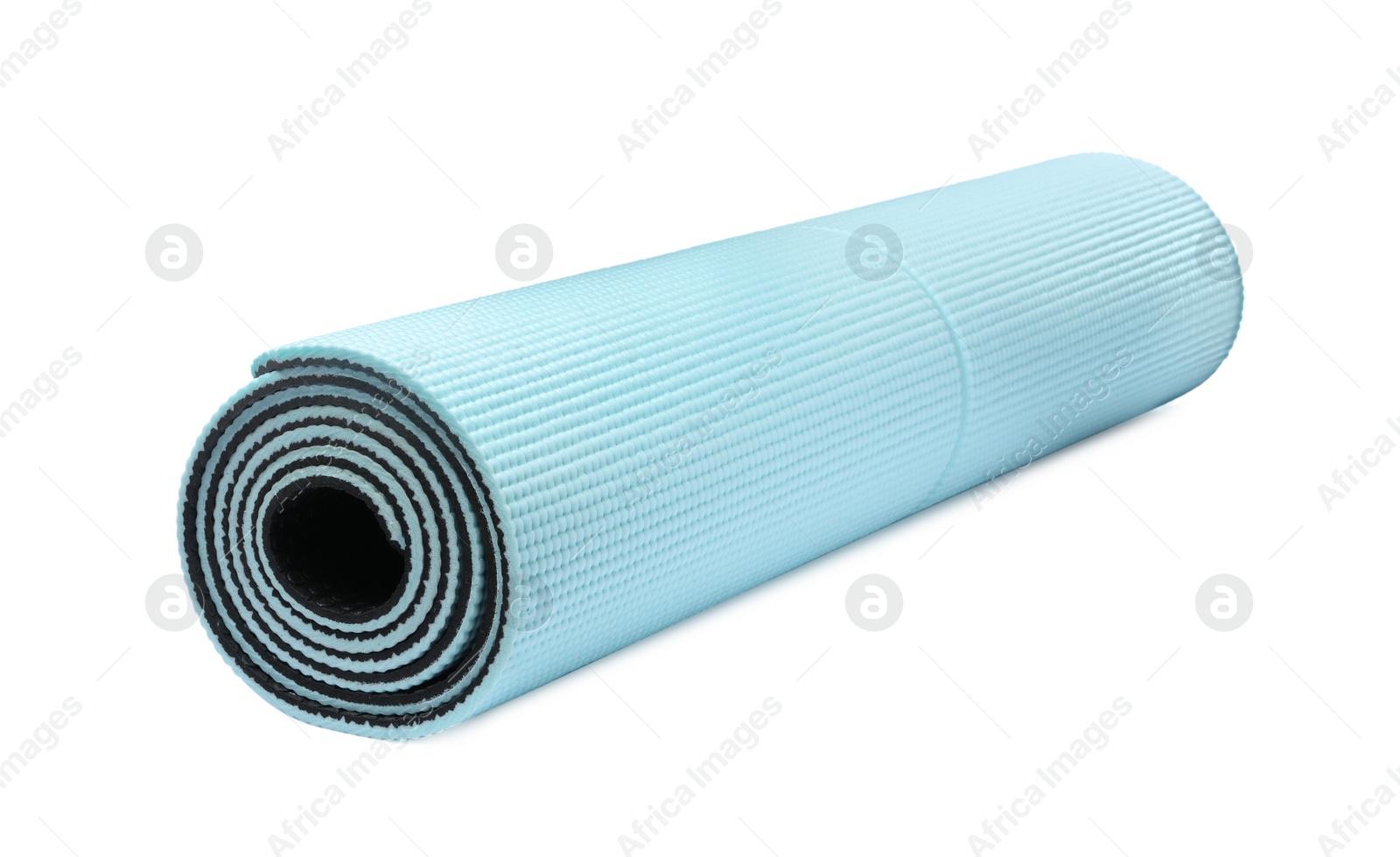 Photo of Rolled light blue camping mat isolated on white