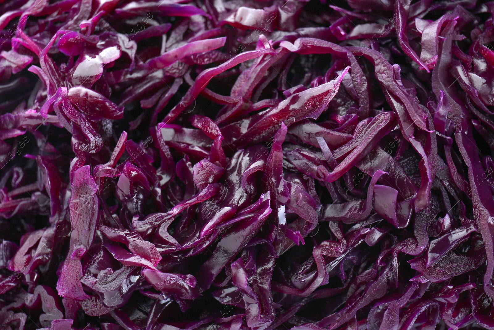 Photo of Tasty red cabbage sauerkraut as background, closeup