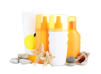 Photo of Different suntan products, seashell, starfishes and stones on white background
