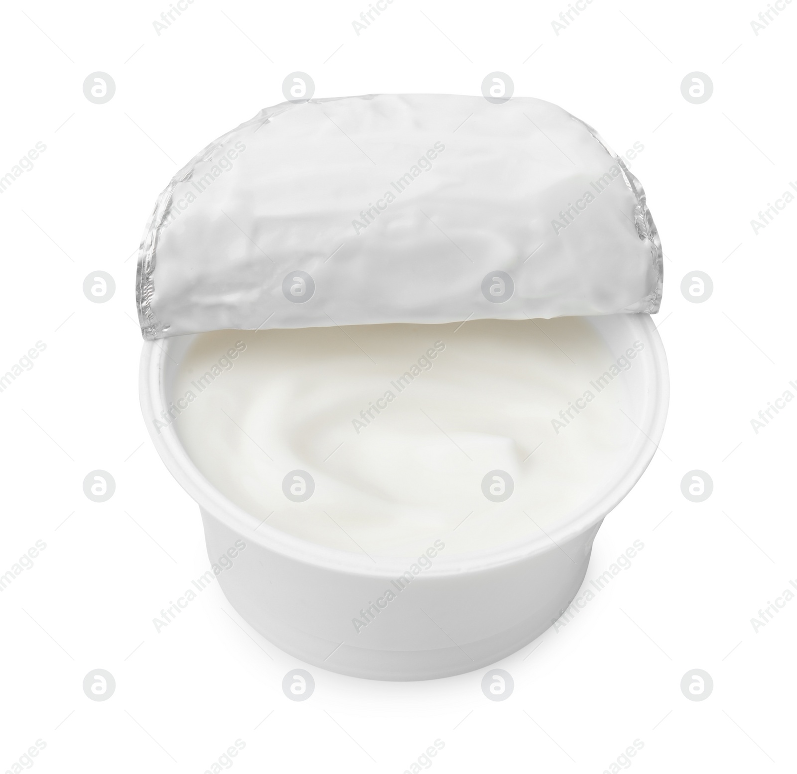 Photo of Delicious natural yogurt in plastic cup isolated on white