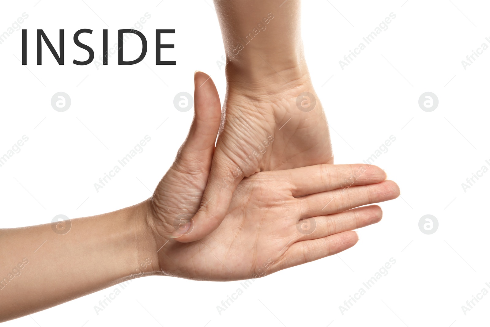 Image of Woman showing word Inside on white background, closeup. American sign language